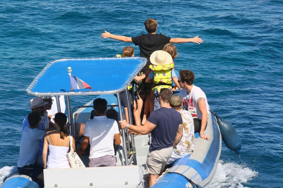  The Beckhams were seen having fun on a boat that took them to the yacht