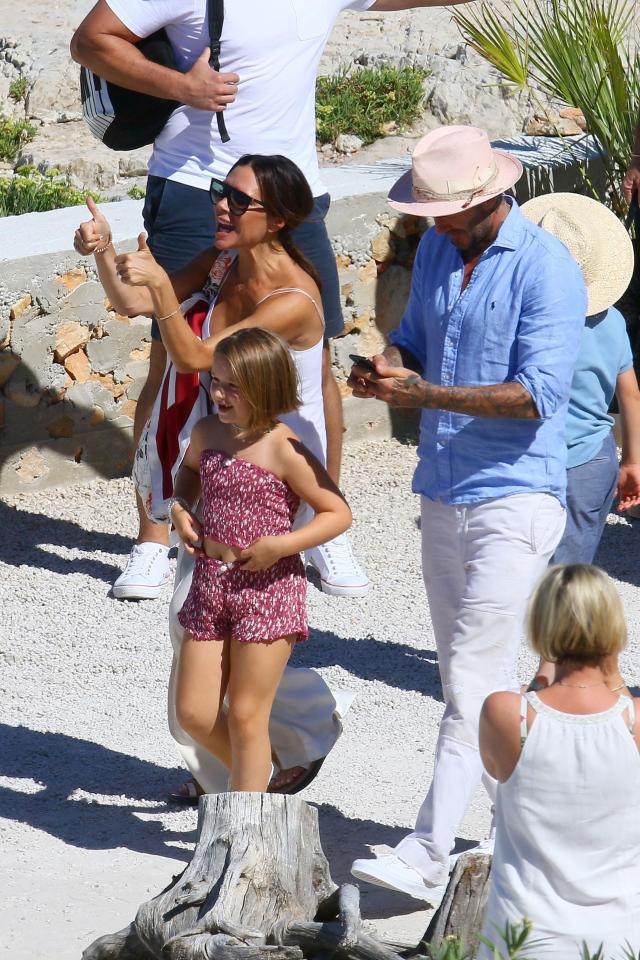  The Beckhams were in great spitits as they headed for Elton John's luxury yacht