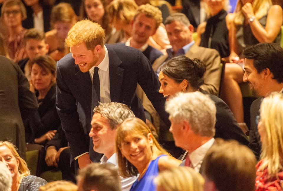  The couple laughed and joked with fellow members of the audience at the Palace Theatre in London