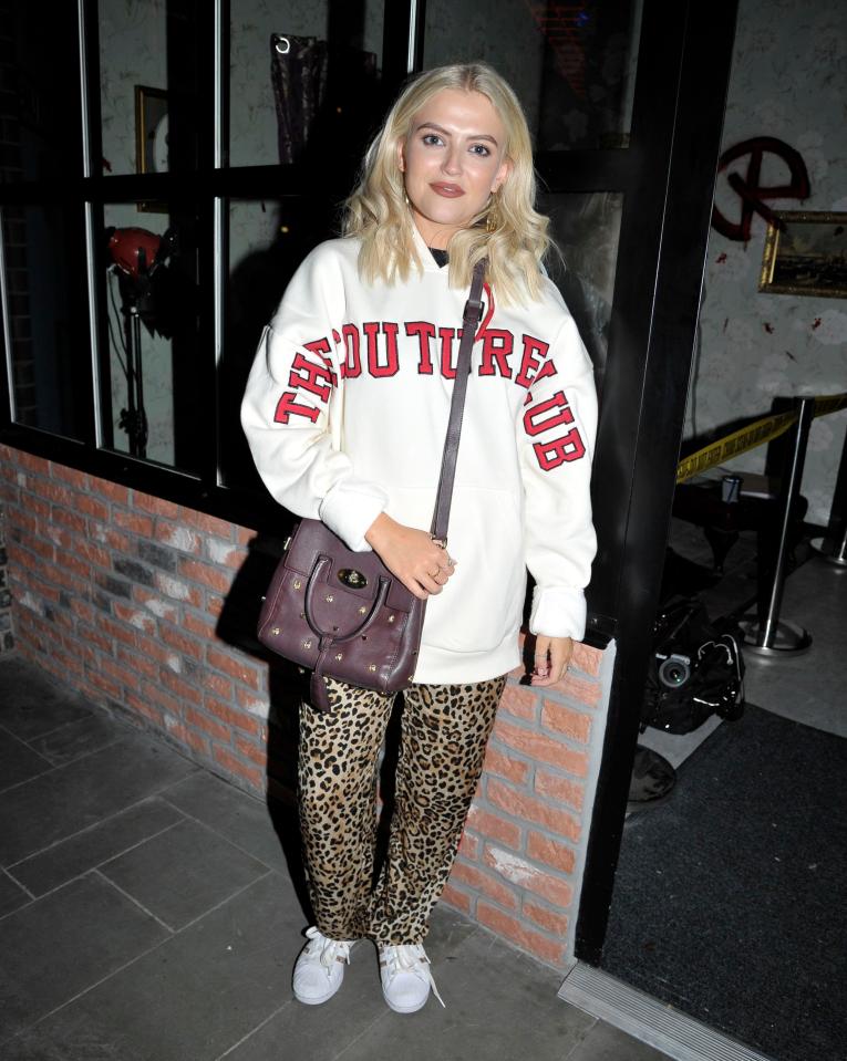  Corrie's Lucy Fallon made a more casual arrival in a baggy logo sweatshirt, leopard print trousers and trainers