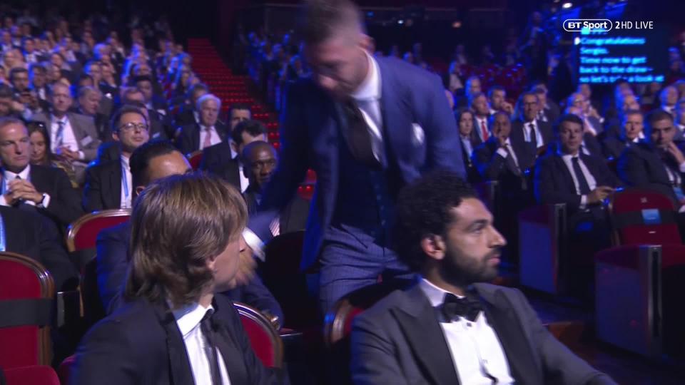  Liverpool ace Salah carried on looking straight ahead after Ramos touched him during the draw in Monaco