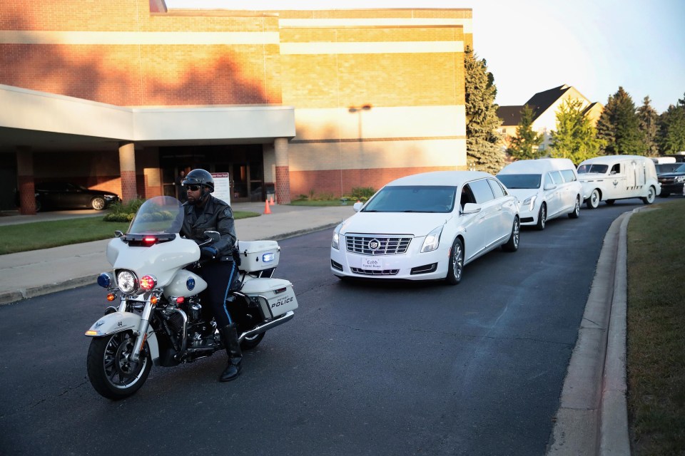 The superstar’s all-white funeral cortege had its own police escort