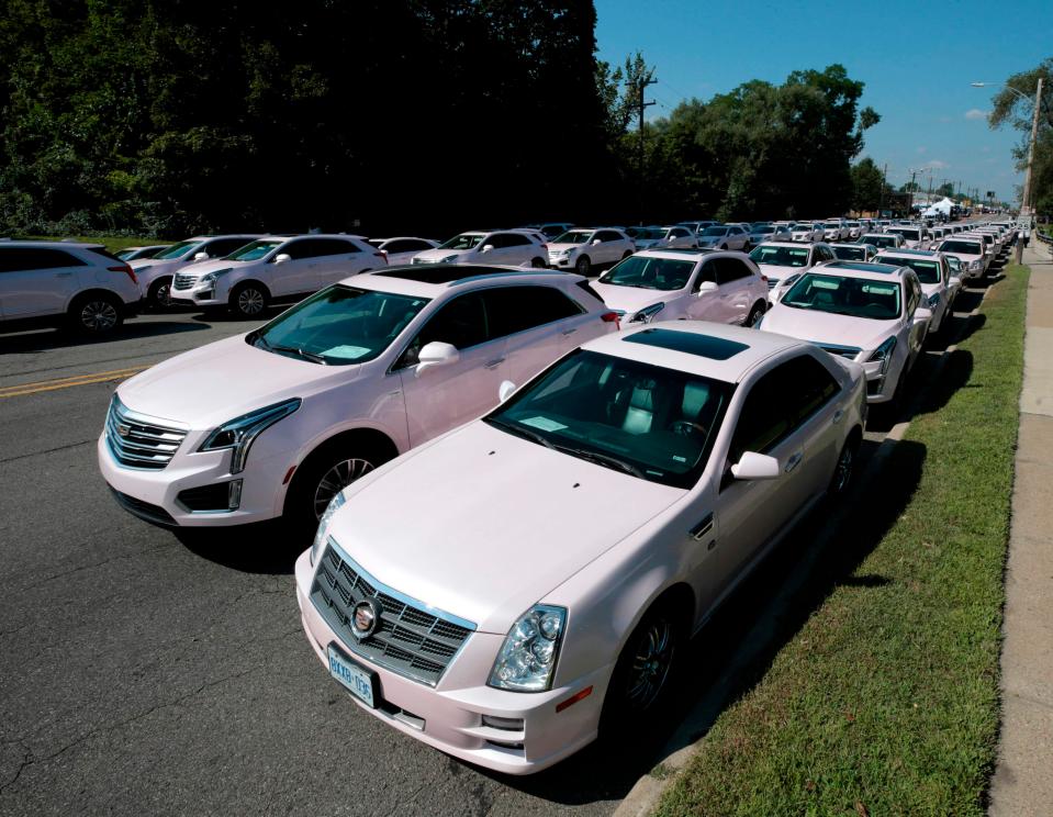  Think, think pink... About 100 pink Cadillacs lined up outside to pay tribute