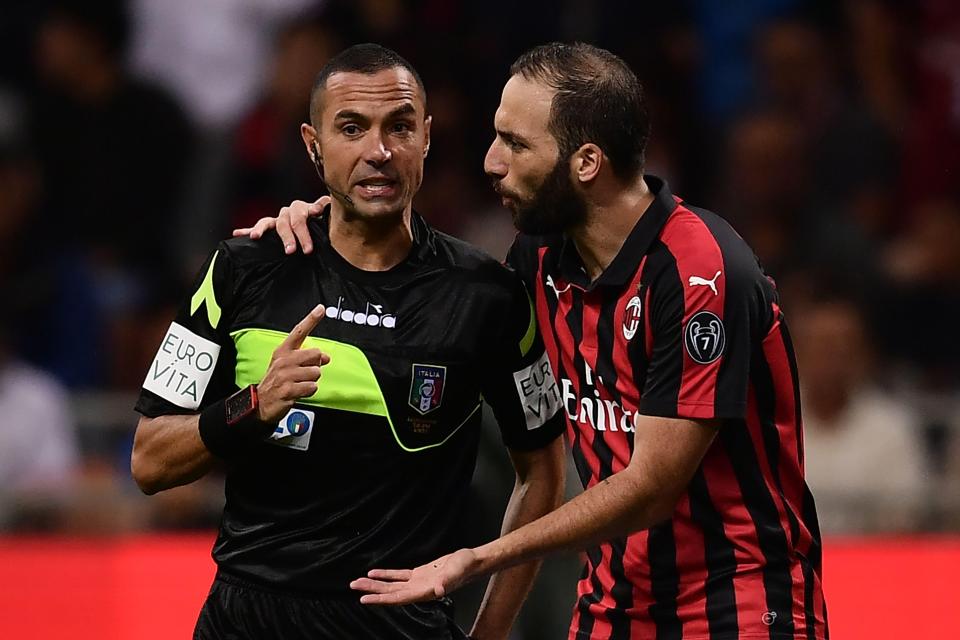  Argentinian ace Higuain gestures with the referee after his strike was ruled out for offside