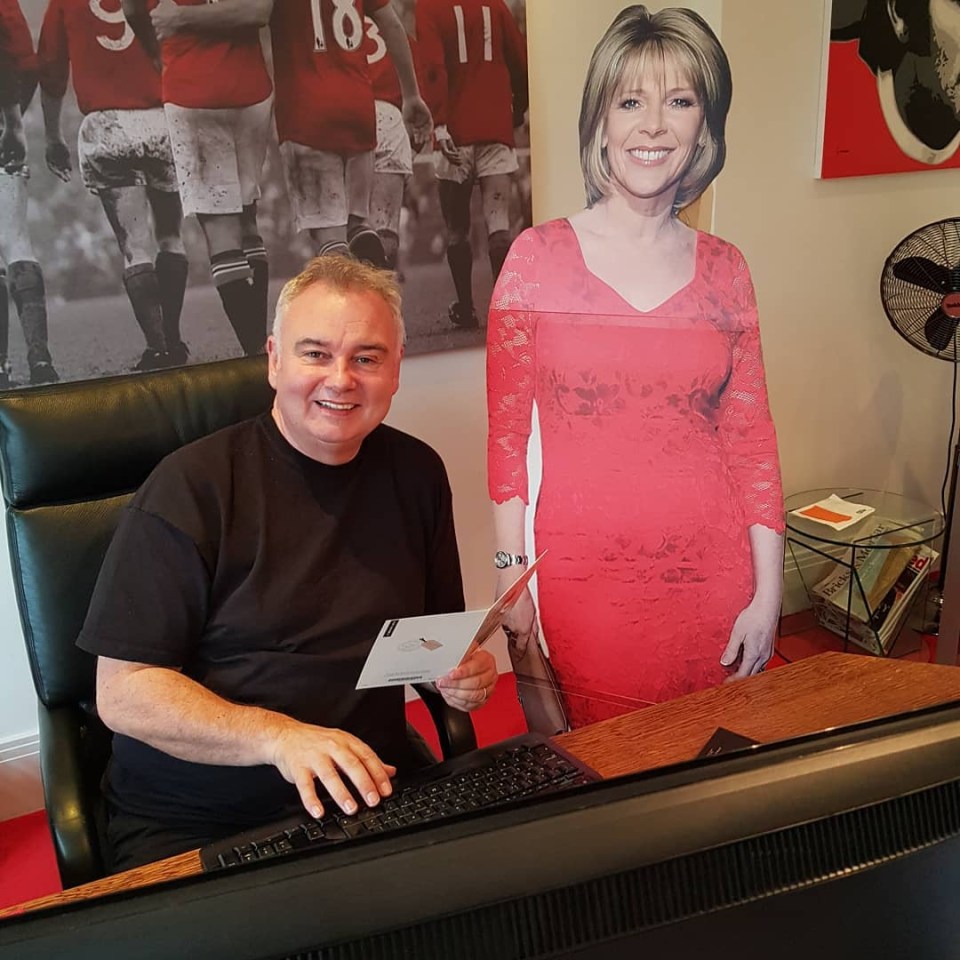 Eamonn brings his Ruth cutout into his Man U man cave