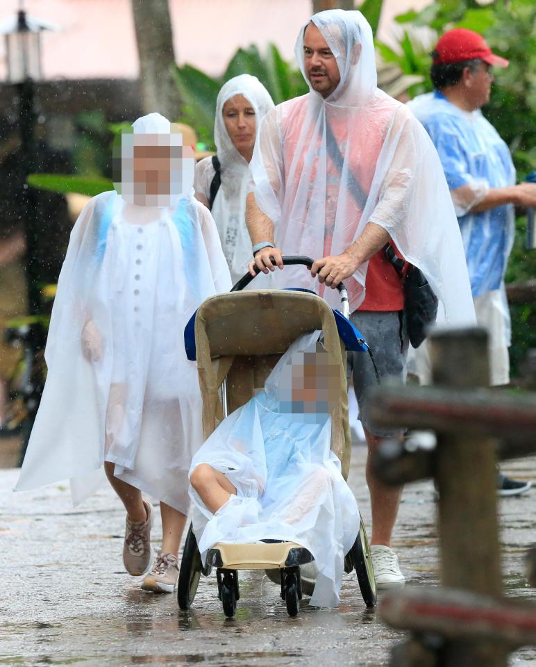  The whole family donned rain macs to stay dry outdoors