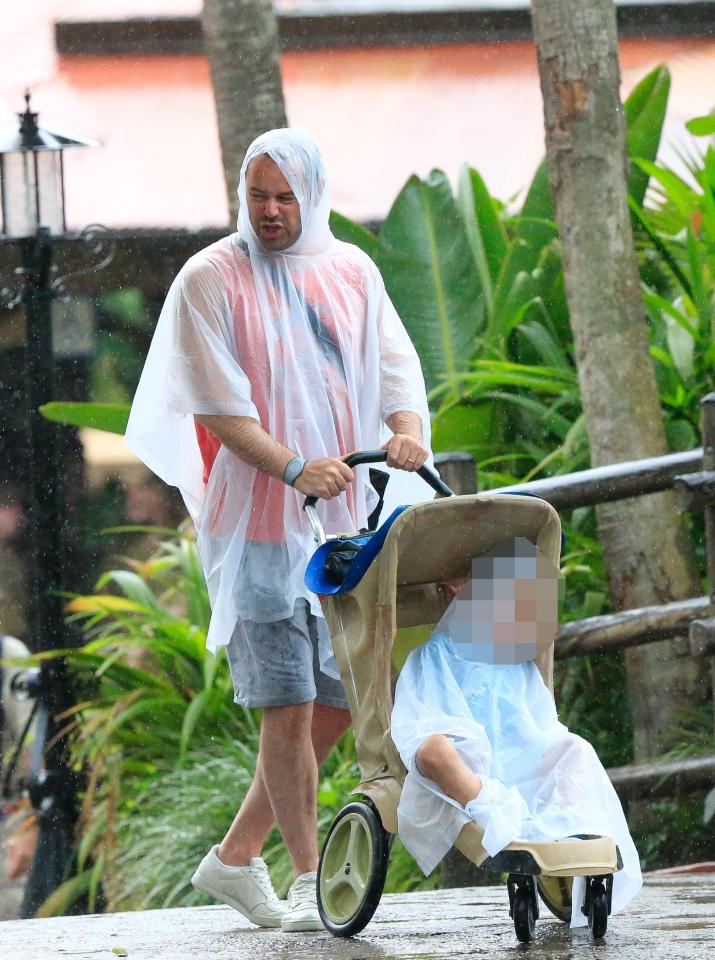  He was seen pushing his youngest in a buggy around the park