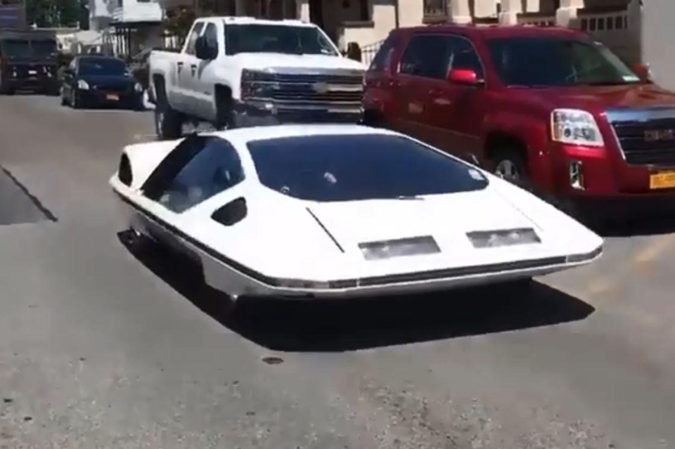 The car almost appears to hover above the road