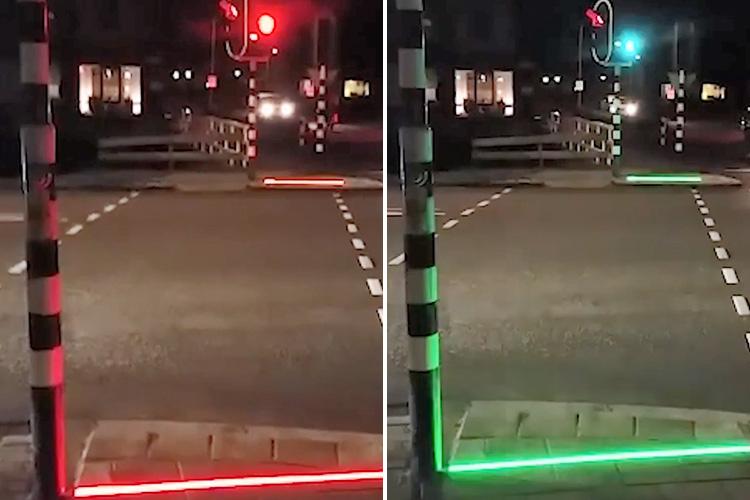  A new scheme could see road signs and lights added to the pavement for smartphone users. Pictured, a similar trial in Holland