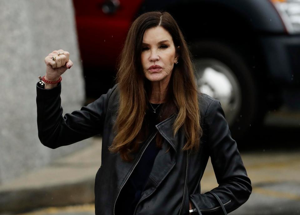  Janice Dickinson celebrates outside of court after her alleged rapist Bill Cosby is sentenced to three to 10 years in prison