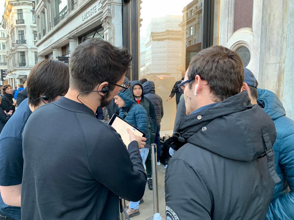  Apple Store staff helped customers pre-register for their devices before they even entered the store