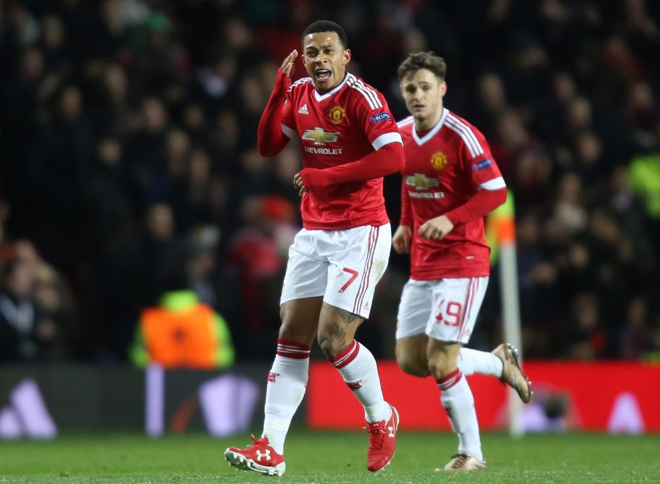  Depay, left, had a frustrating 19 months at Old Trafford