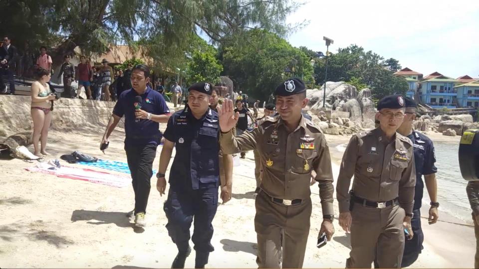  Thai police, seen here at the beach in Koh Tao where a Brit backpacker claims she was raped, lead a press parade on Tuesday