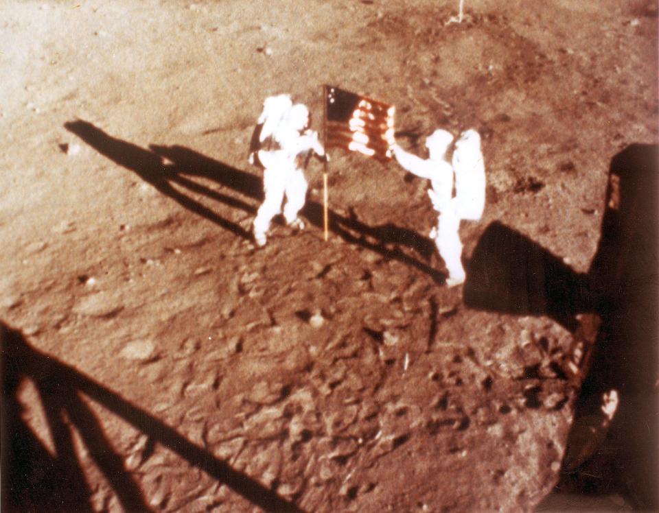 Stars and gripes as rivals Neil Armstrong and Buzz Aldrin deploy the US flag on the moon in 1969