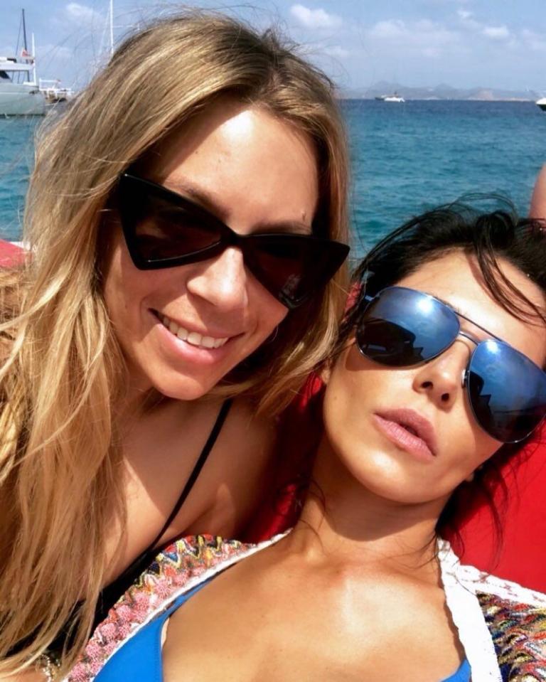  Cheryl looked asleep while on holiday with a pal