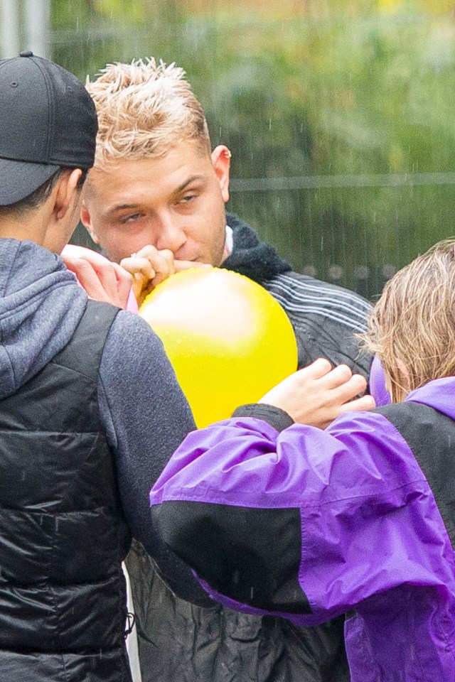 Jude Law’s son Rafferty has been pictured appearing to inhale a balloon at Notting Hill Carnival