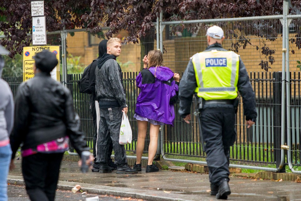 After talking to the policeman they walked off to continue their day out