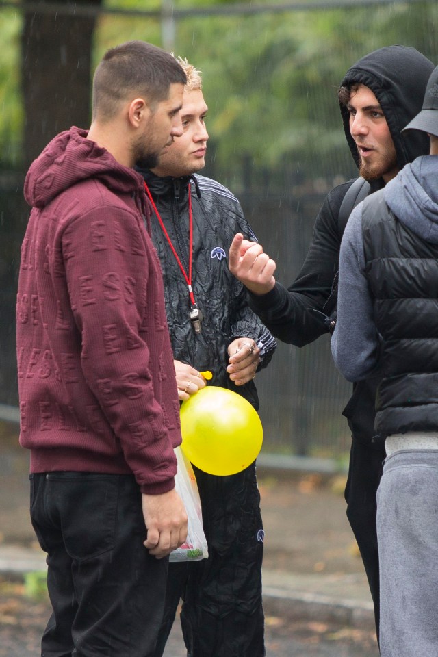 He looked as though he was enjoying the spirit of the annual event with his friends