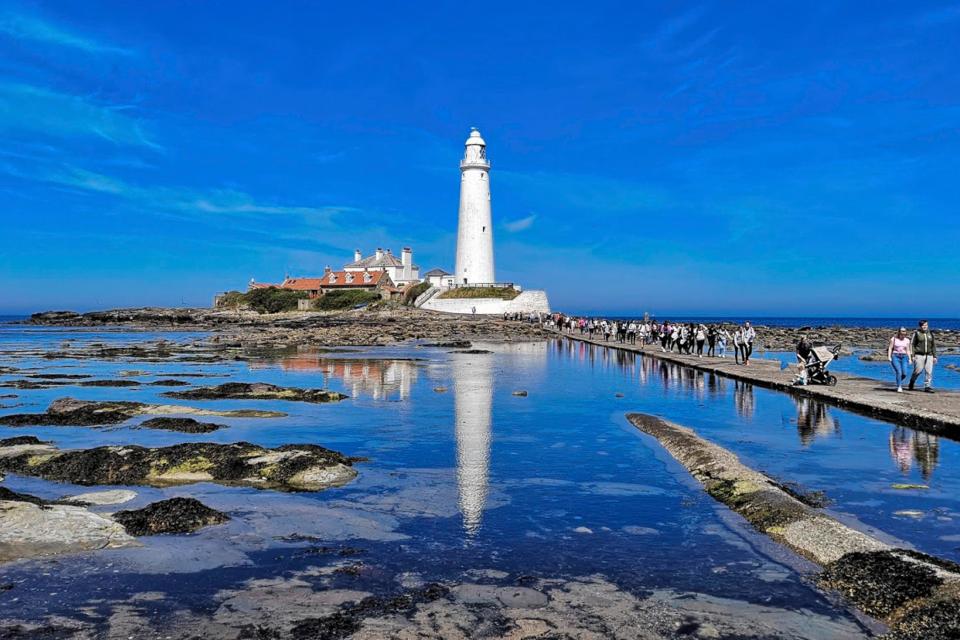  A blue sky over St Marys Lighthouse, Whitley Bay on the North Eat coast