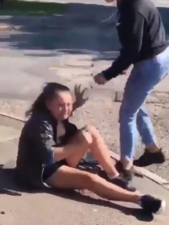  She pleads with the attacker to stop as the older girls cowardly mates giggle and film