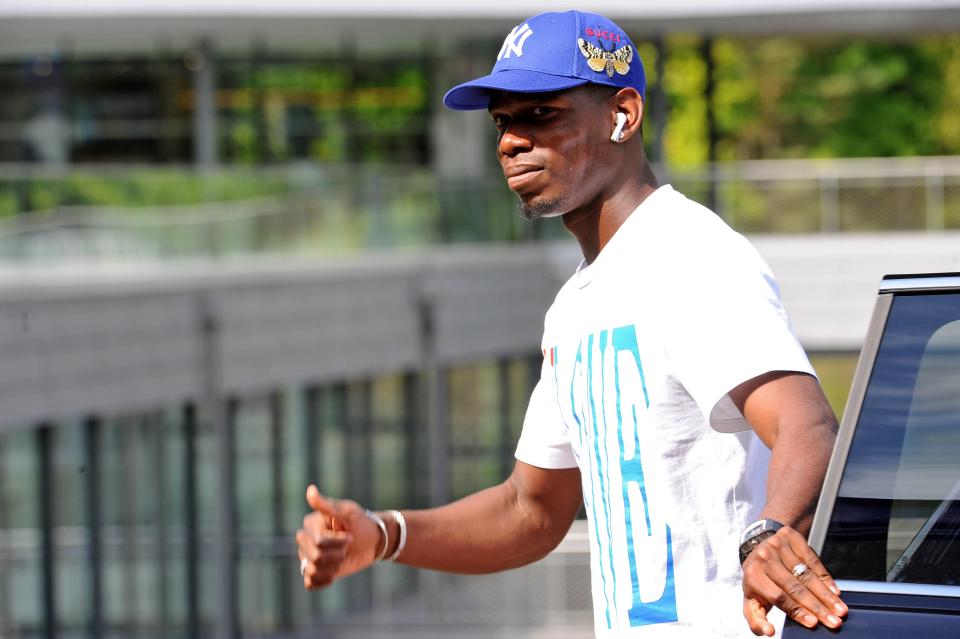  Paul Pogba arrives at France training after helping inspire their triumph in Russia