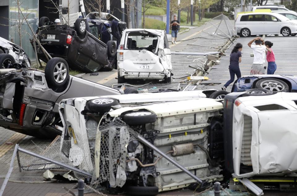  Wrecked vehicles in Osaka in the wake of Typhoon Jebi in 2018, Japan's worst storm for 25 years