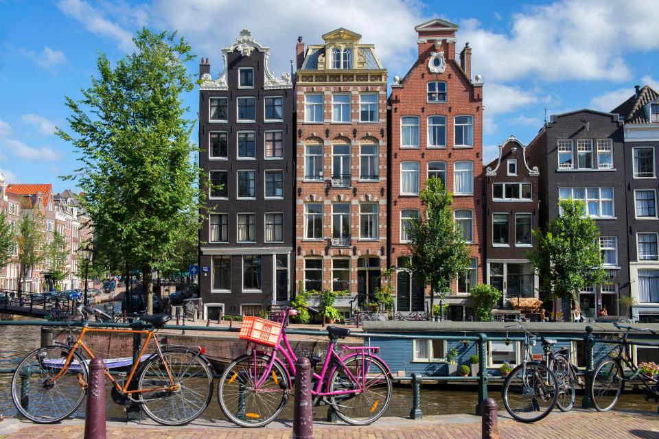  Canal houses and bicycles along Herengracht in Amsterdam