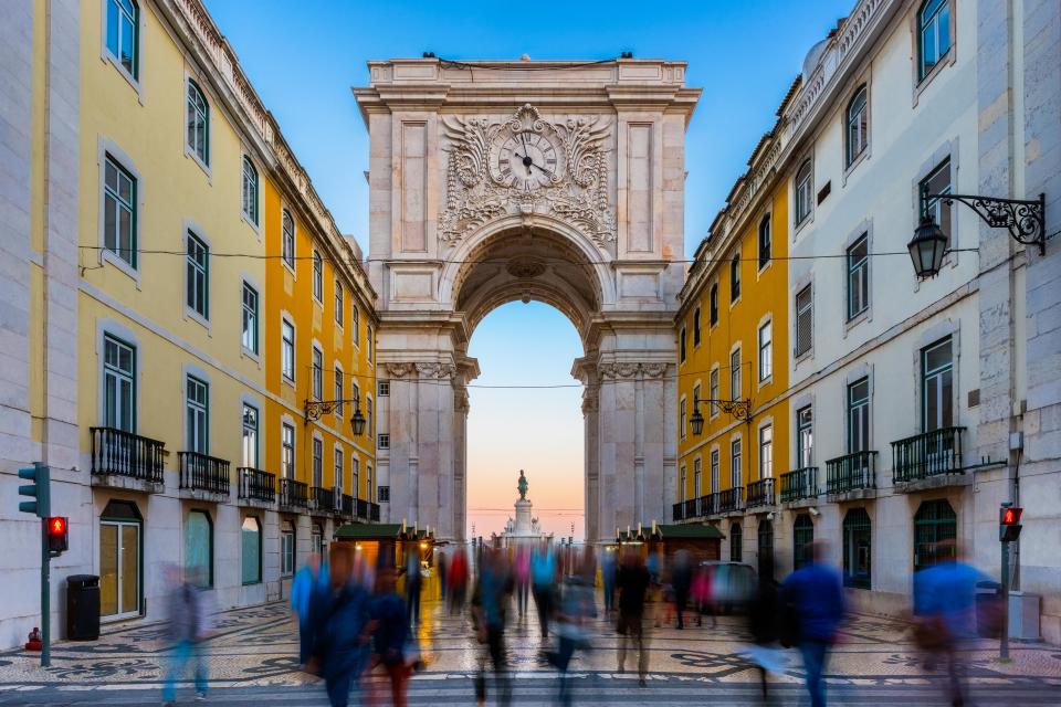  Rua Augusta Arch in Lisbon, Portugal, around sunset