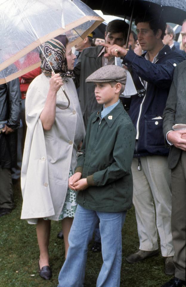  The Queen has been rocking matching umbrellas since her children were young