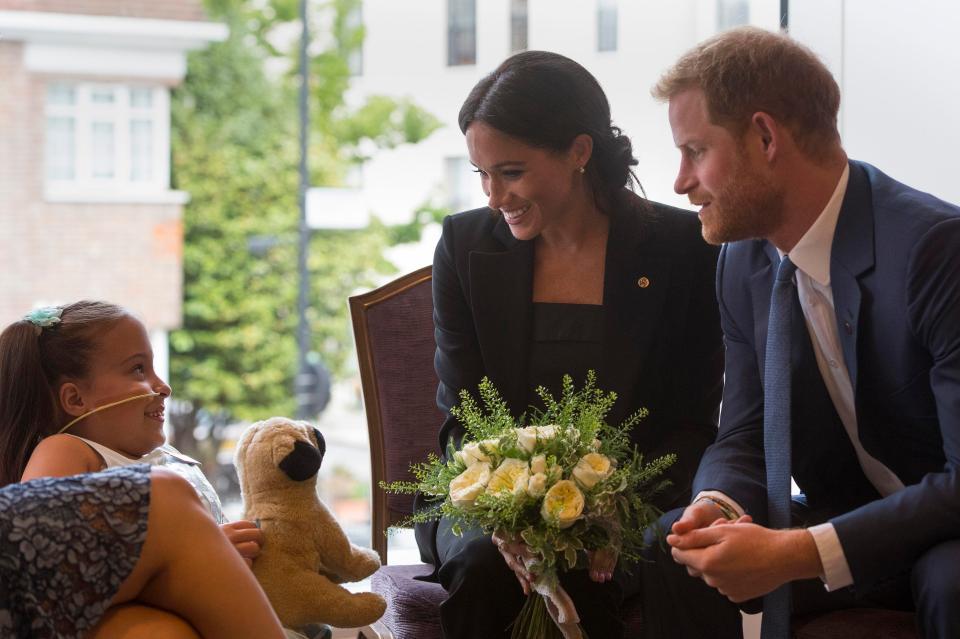  Prince Harry and Meghan Markle paid tribute to seriously ill kids at a star-studded award ceremony, where he told Matilda Booth, 7, to "never stop smiling"