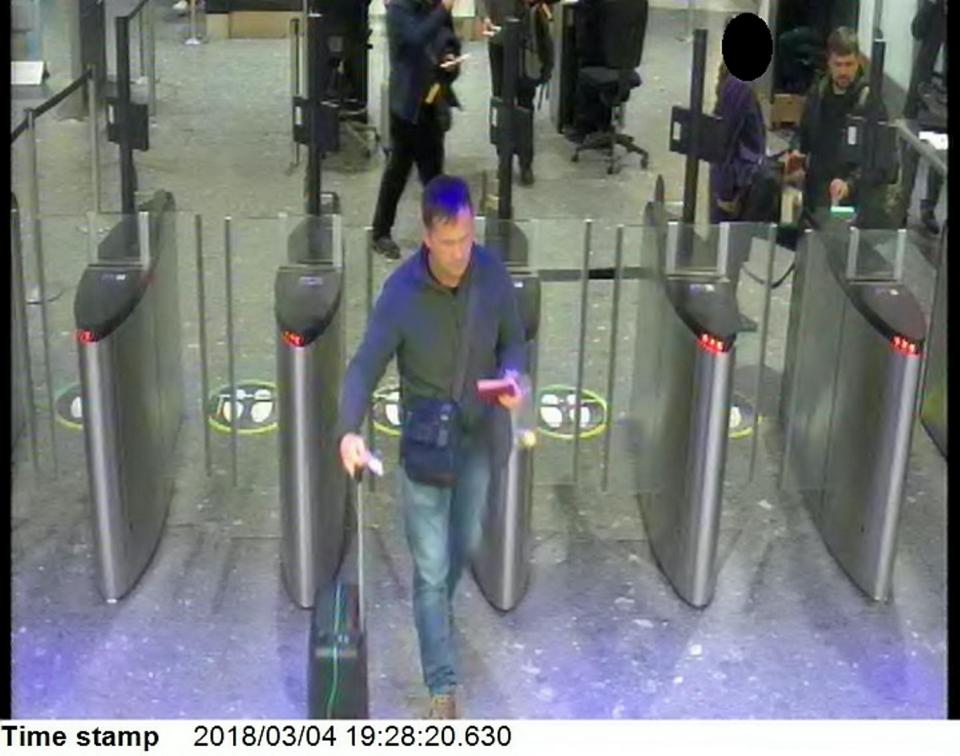  Both spies are seen at Heathrow airport security at 19:28hrs on March 4