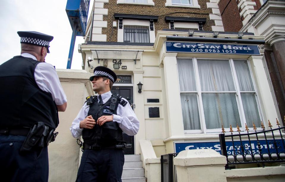  Police outside the City Stay Hotel in East London