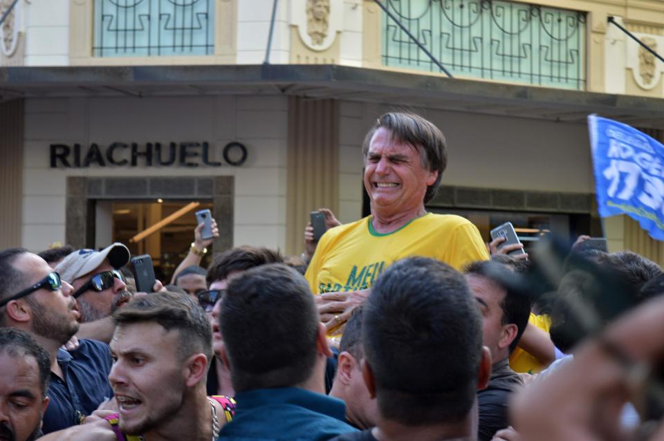  Brazilian presidential candidate Jair Bolsonaro was stabbed during a campaign rally - his assailant's knife can be seen a foot in front of his head