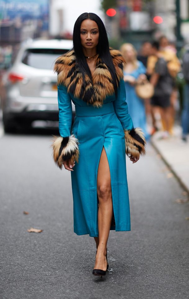  Draya Michelle looked fierce in this bright blue coat dress with a leopard print fur collar and cuffs