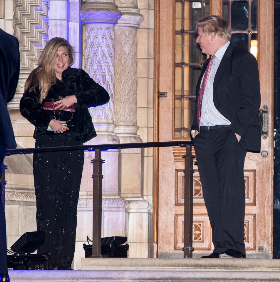  The couple share smiles at the Tories' Black and White Ball in February