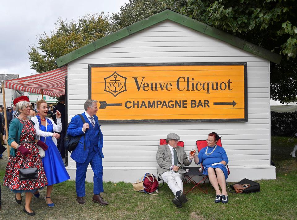  Punters enjoying a drink near the Veuve Clicquot Champagne Bar