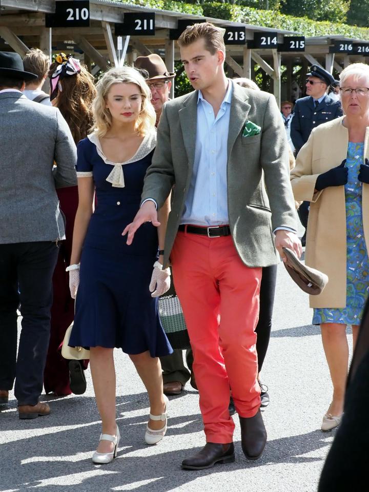  She was attending the event with a male friend donning red trousers