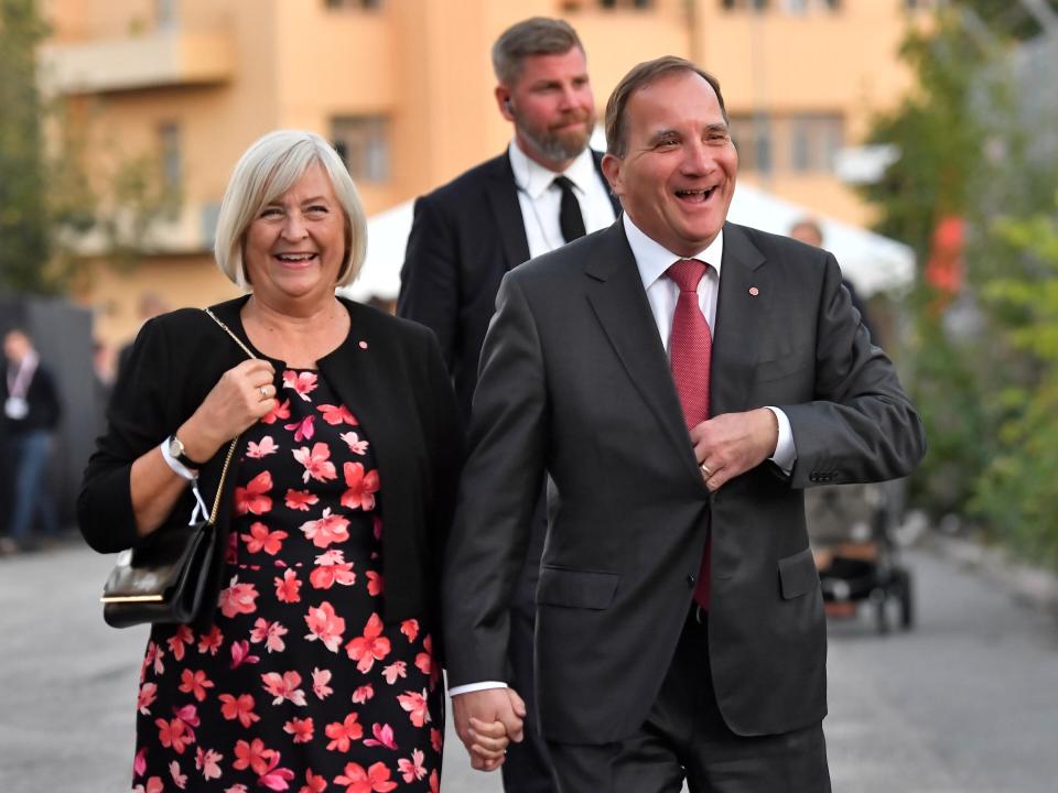  Swedish Prime Minister Stefan Lofven and his wife Ulla appear cheerful as they arrive at the Social Democratic Party's election wake