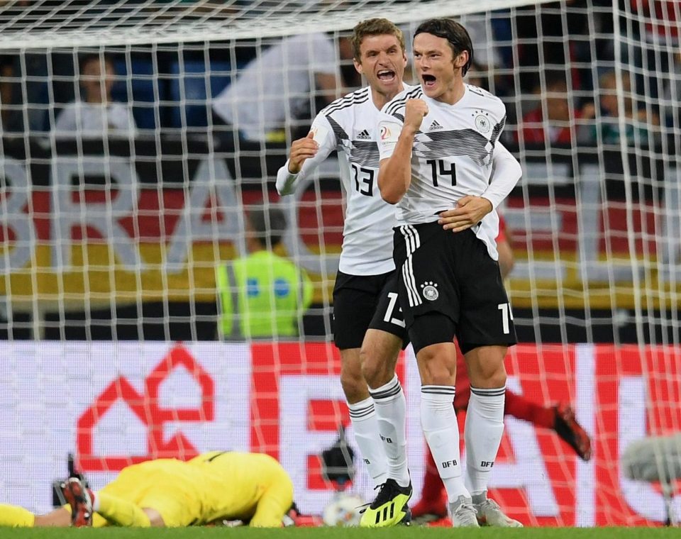  Nico Schulz, right, netted a late winner for Germany against Peru on Sunday night