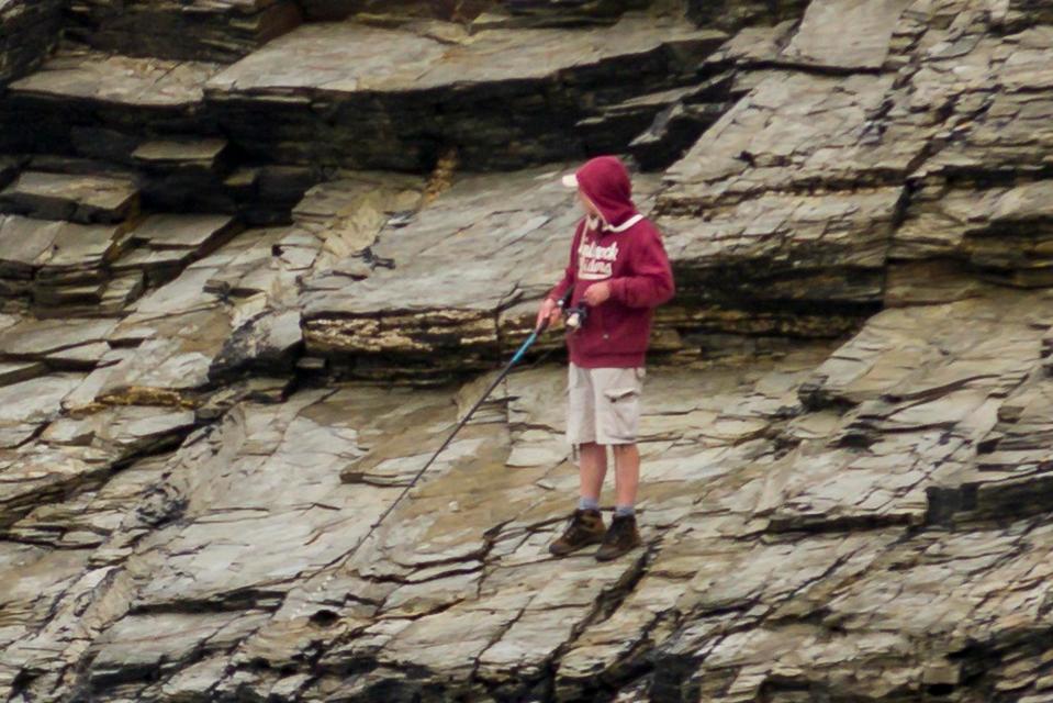  The fisherman made it back to safety after a couple of hours on the rocks