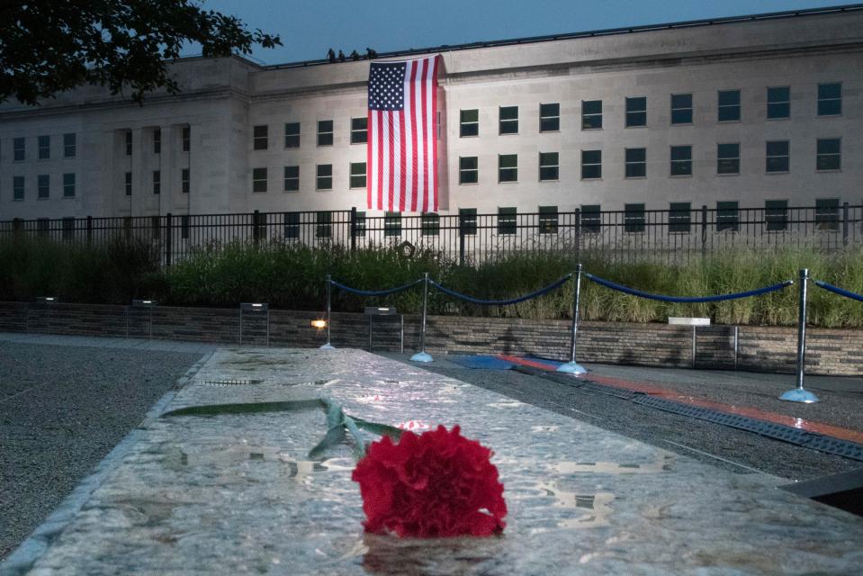  The US national flag is seen draped at the Pentagon building at dawn in remembrance of 9/11