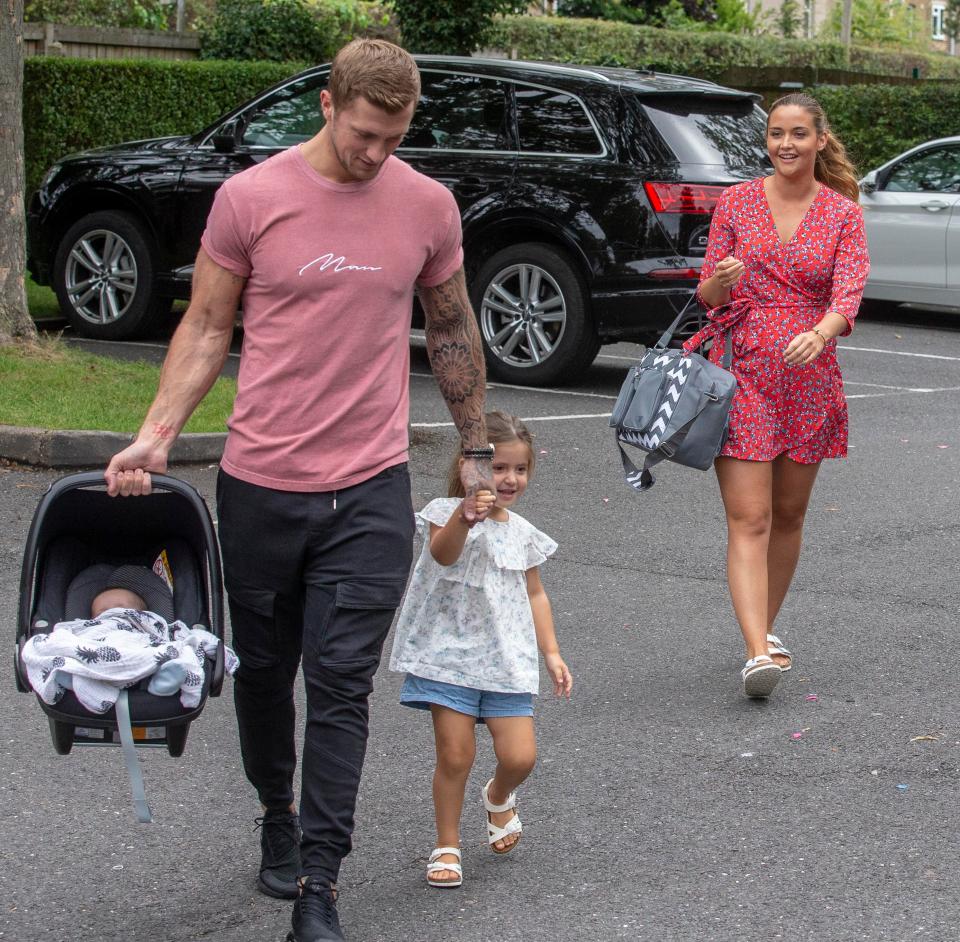  Jaqueline with husband Dan and their daughters Ella, three, and Mia, three