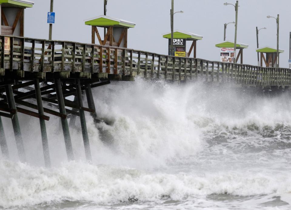  Waves from Hurricane Florence pound the Bogue Inlet Pier in North Carolina