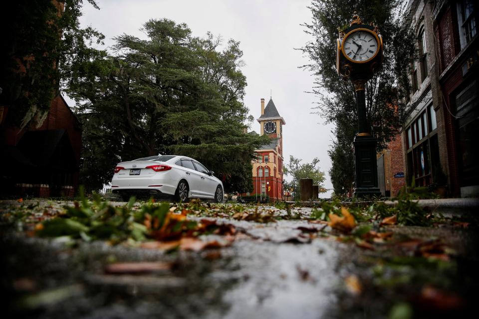  Tree leaves and branches are seen on the street as Hurricane Florence comes ashore in New Bern