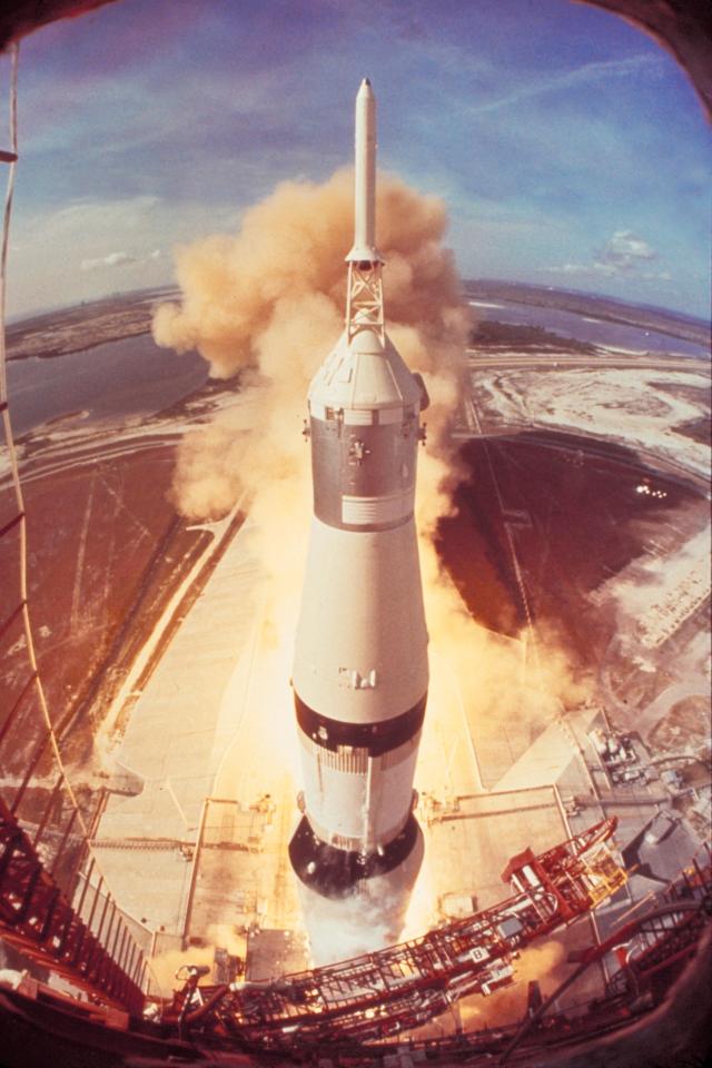 Apollo 11 mission lifting off on its historic 1969 flight to moon during which astronauts Buzz Aldrin and Neil Armstrong walked on lunar surface