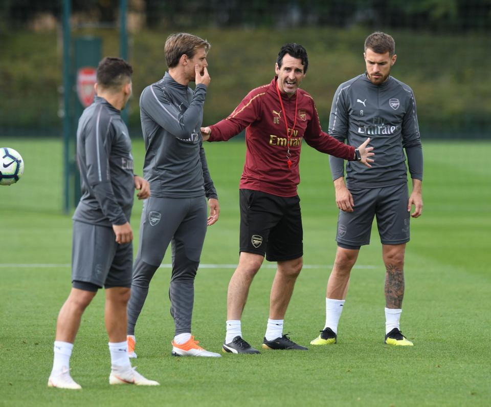  Ramsey, right, with boss Unai Emery ahead of the Gunners' trip to Newcastle today