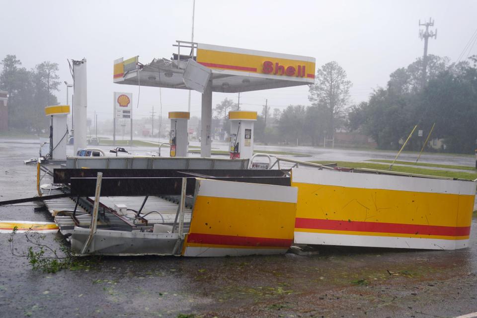  A petrol station with its roof blown off in Wilmington, North Carolina