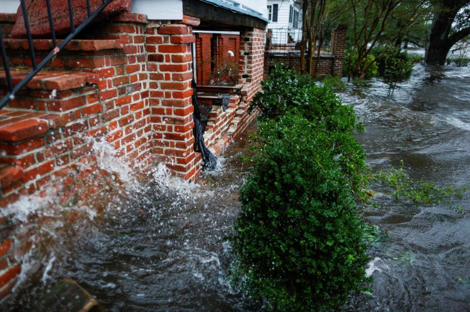  Water from the Neuse river floods houses after thousands of people evacuated the Carolinas