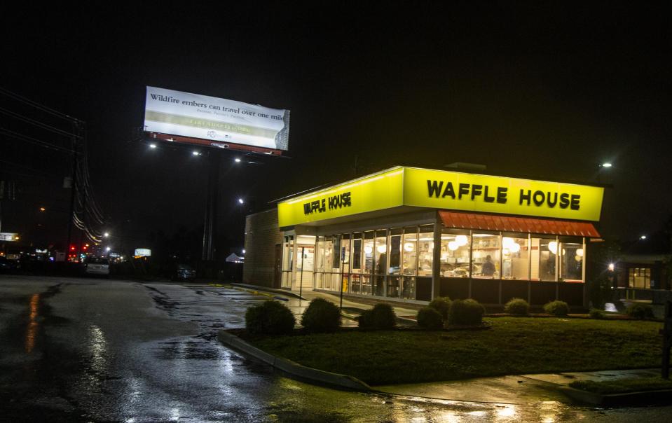  An open South Carolina Waffle House sits deserted as the centre of Tropical Storm Florence blows through