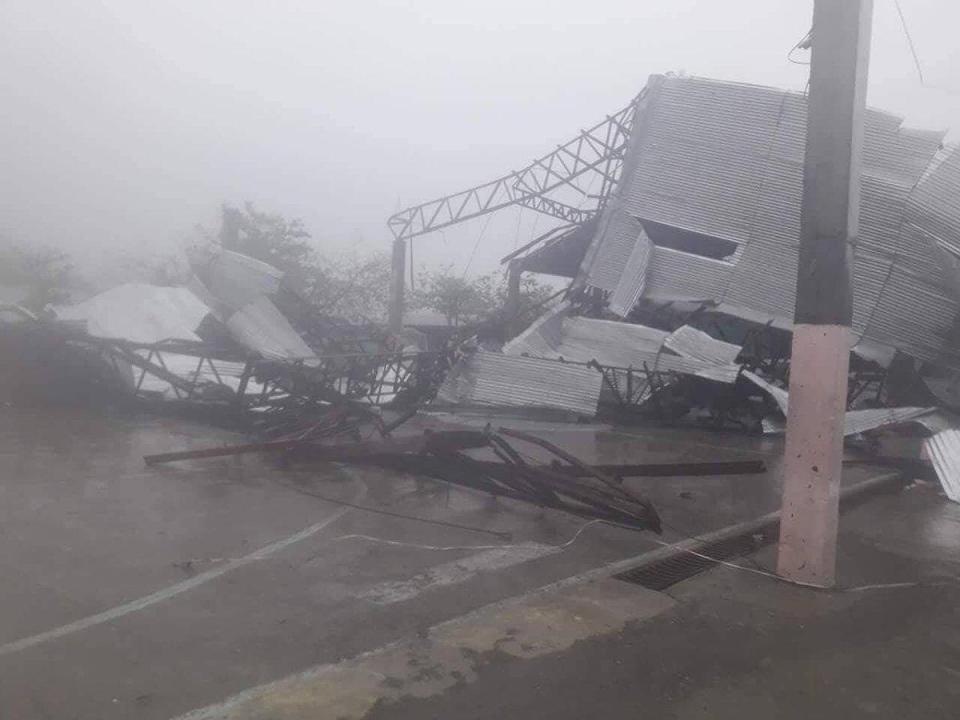  A building is destroyed in Laoag as the typhoon smashed the Philippines